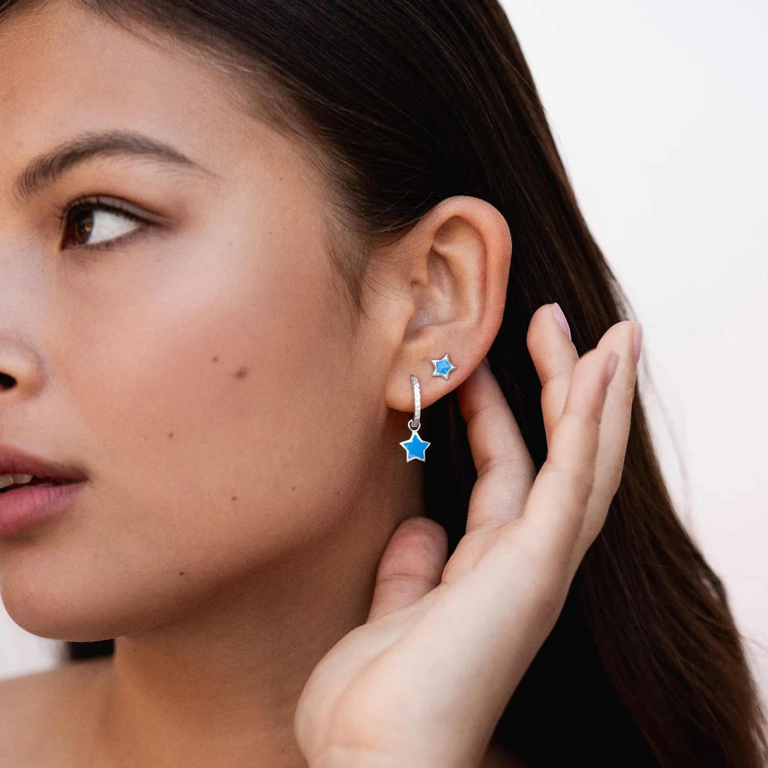 Blue Enamel Narrative Star Huggie Hoops sold by Dower & Hall product image thumbnail 3