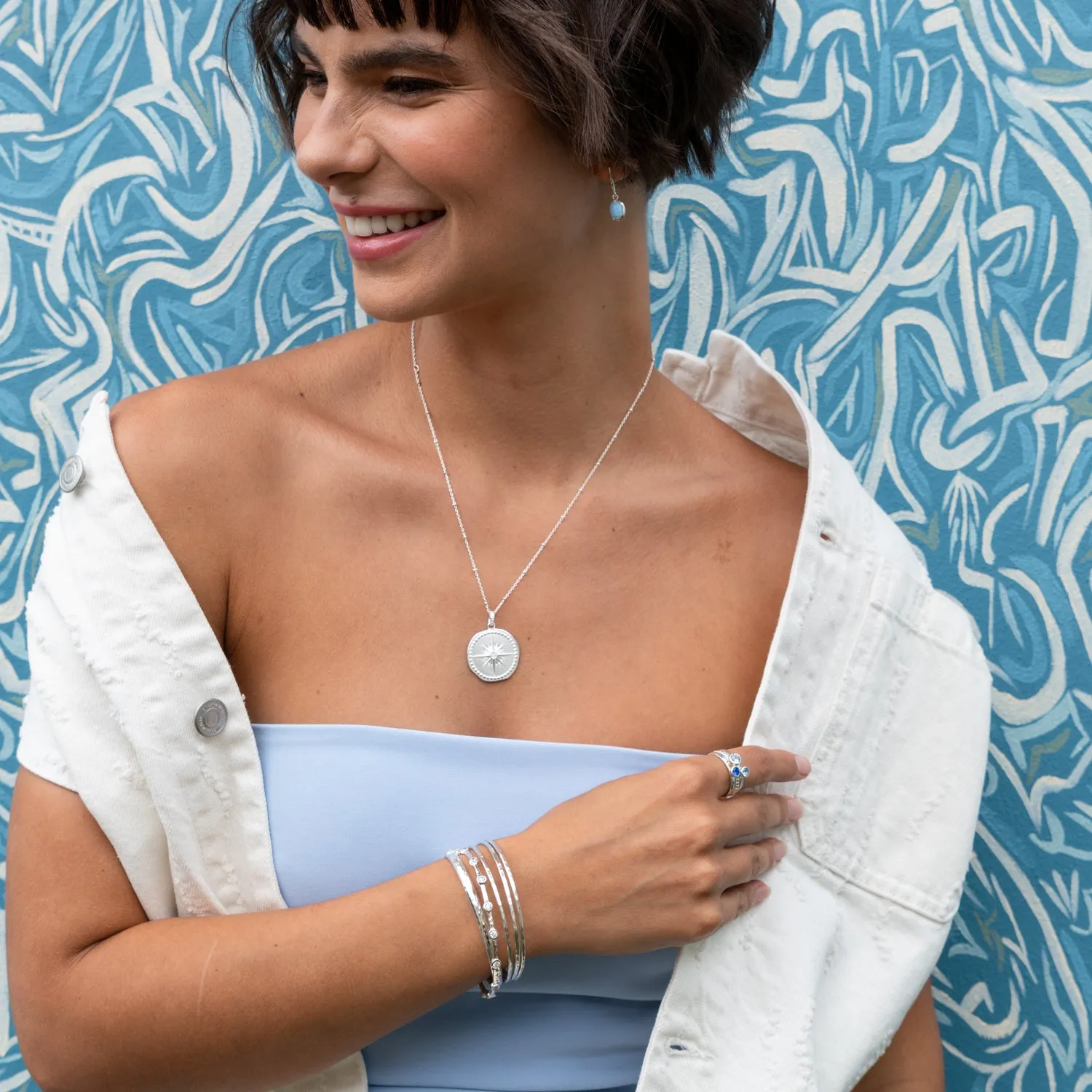 Round White Topaz Array Bangle sold by Dower & Hall product image thumbnail 3