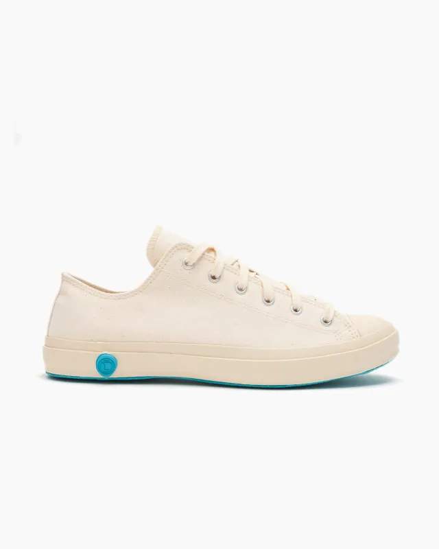 Off White Canvas Sneakers sold by John Simons
