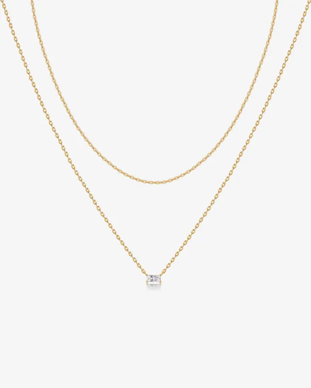 Layered Baguette Pendant Necklace sold by PAVOI