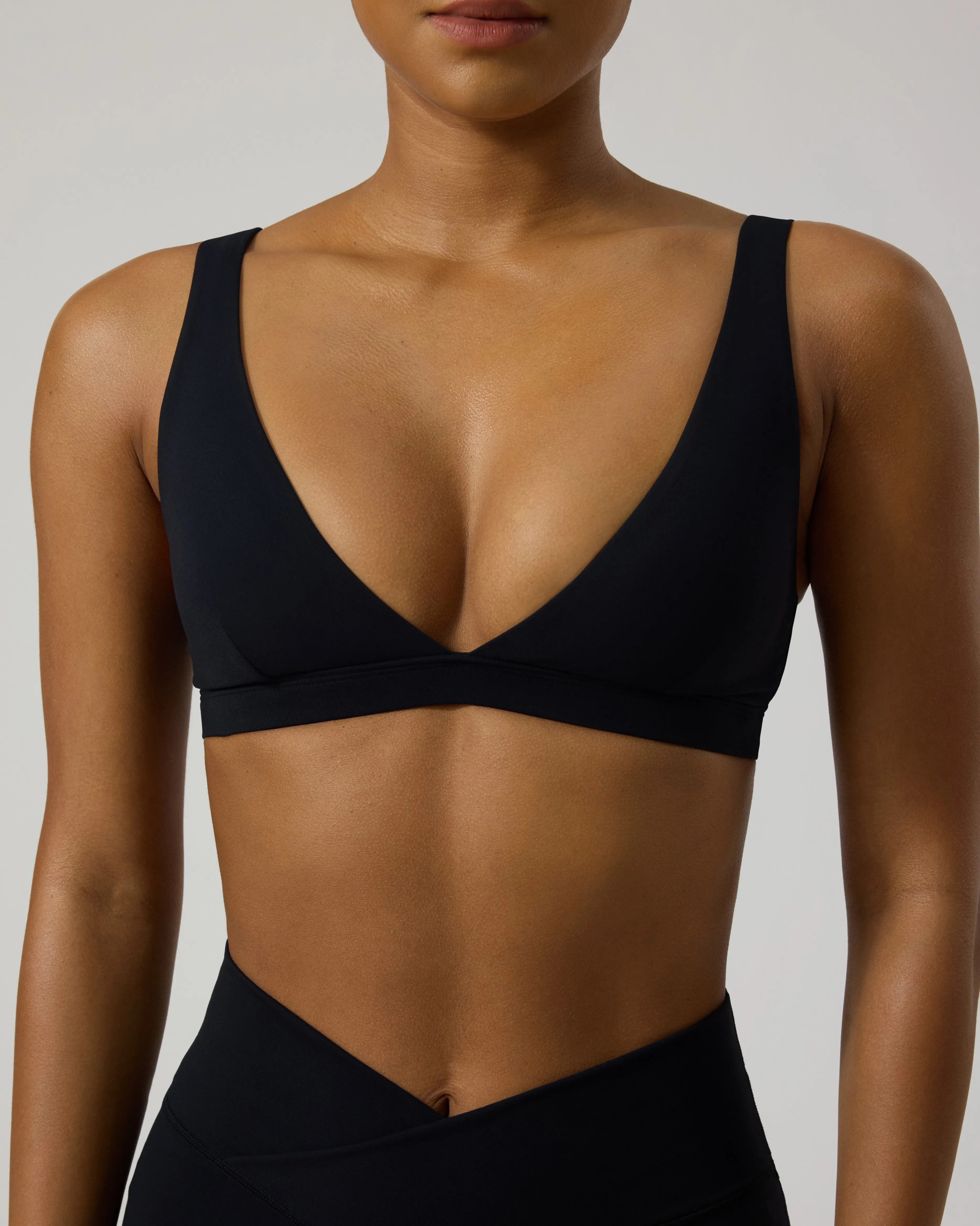 FlexFlow Plunge V Neck Open Back Sports Bra sold by PAVOI