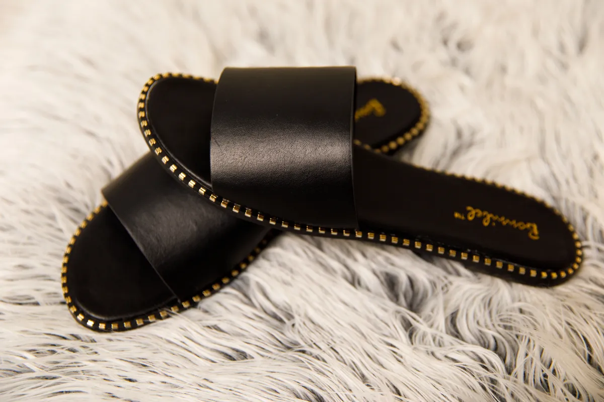 Kassidy slide sandal black and gold sold by The Modish Box