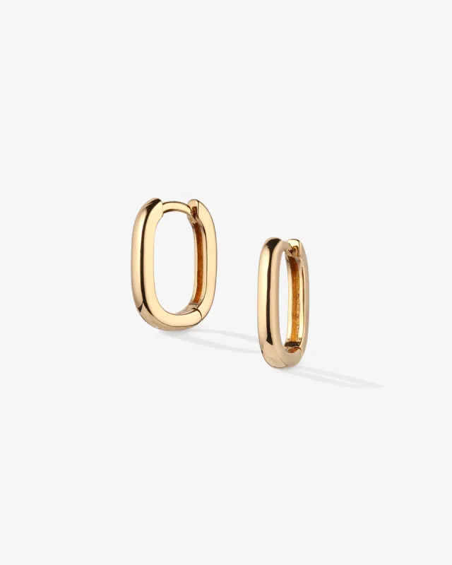 Oval Huggie Hoops sold by V Coterie