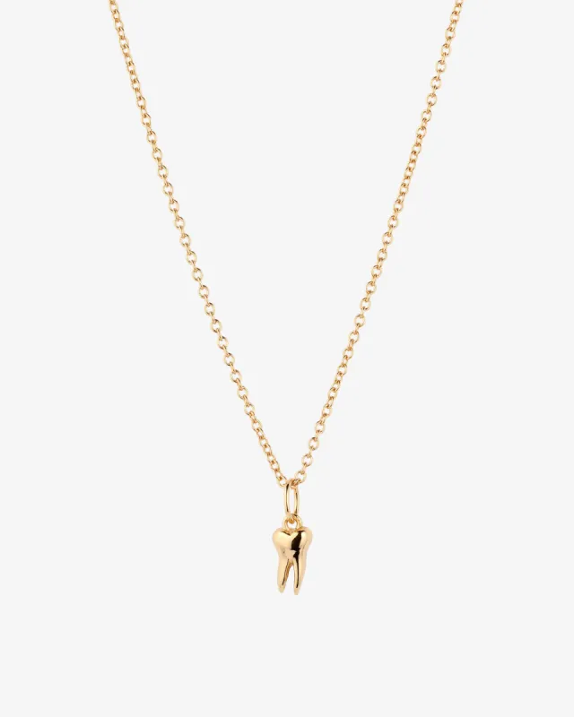 Tiny Tooth Necklace sold by V Coterie