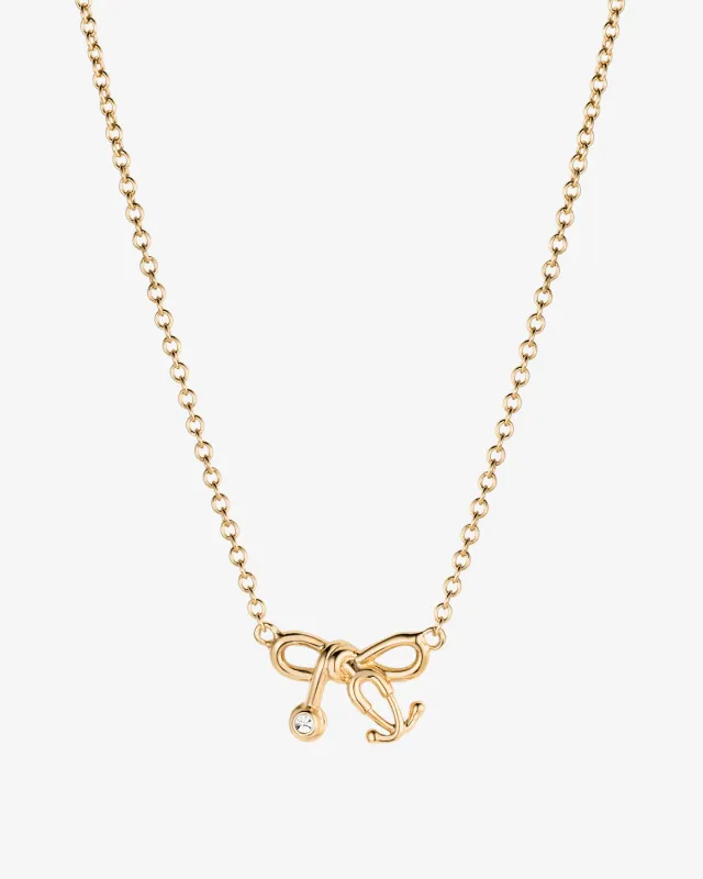 Tiny Stethoscope Bow Necklace sold by V Coterie