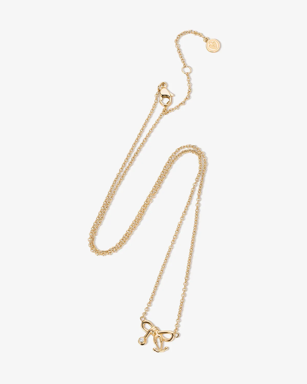 Tiny Stethoscope Bow Diamond Necklace sold by V Coterie product image thumbnail 2