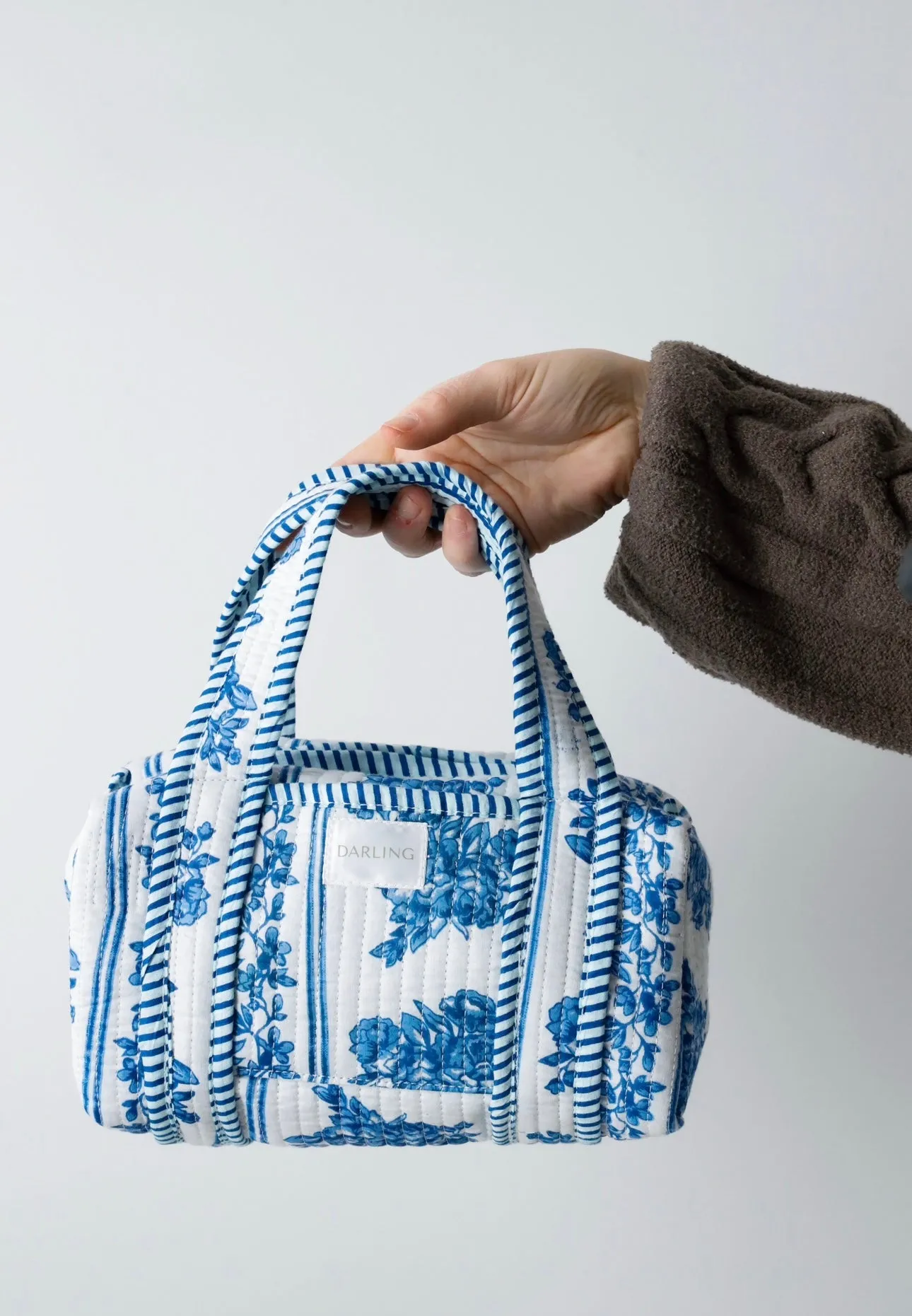 Quilted Handled Cosmetic Bag - French Blue Floral sold by Darling Loungewear