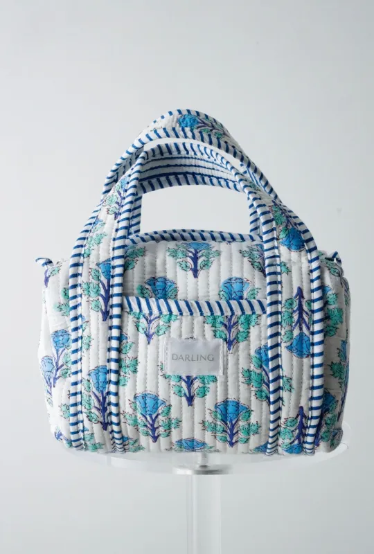 Quilted Handled Cosmetic Bag - Coastal Blue sold by Darling Loungewear