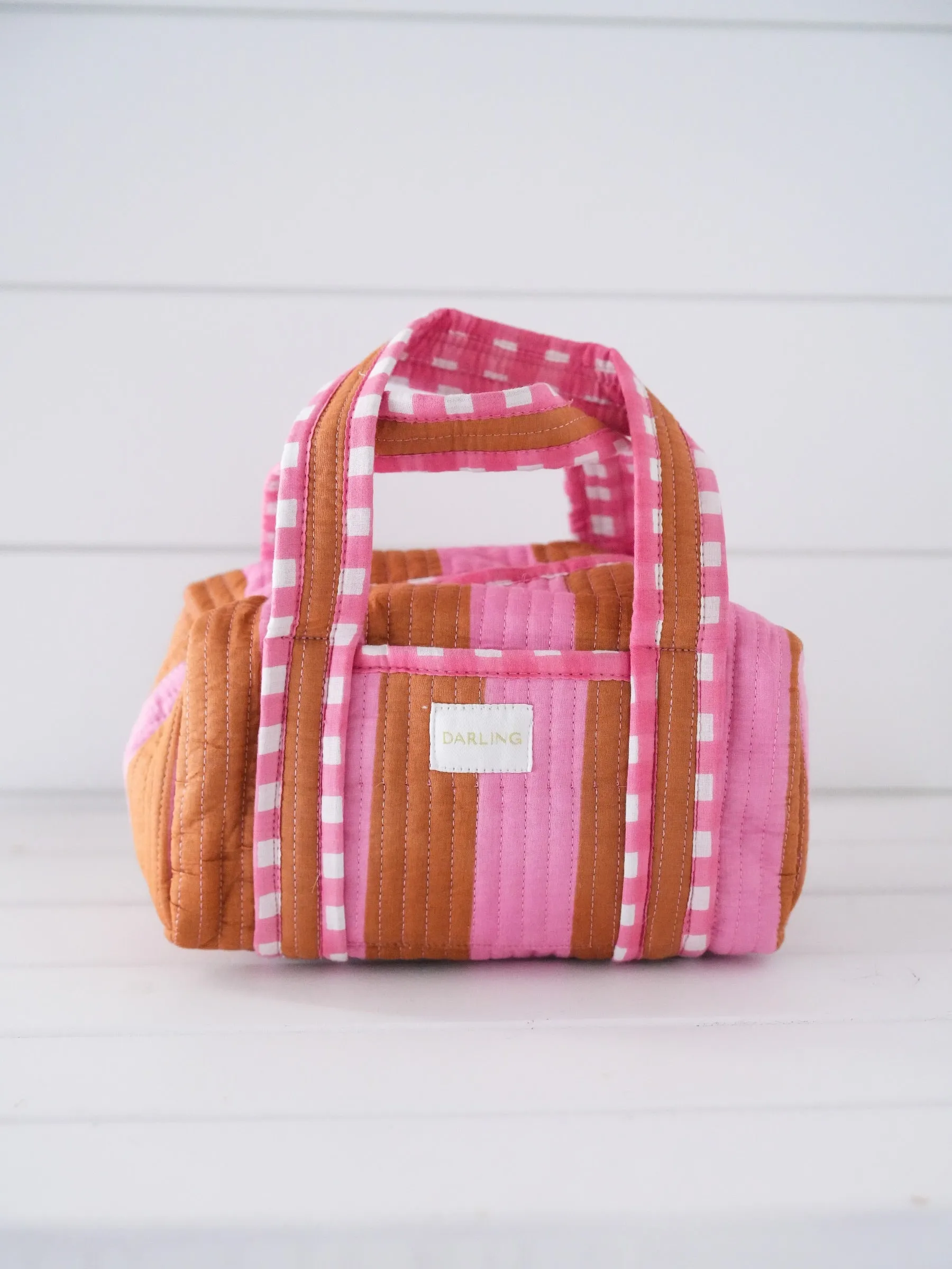 Quilted Handled Cosmetic Bag - Pink Saddle Stripe sold by Darling Loungewear