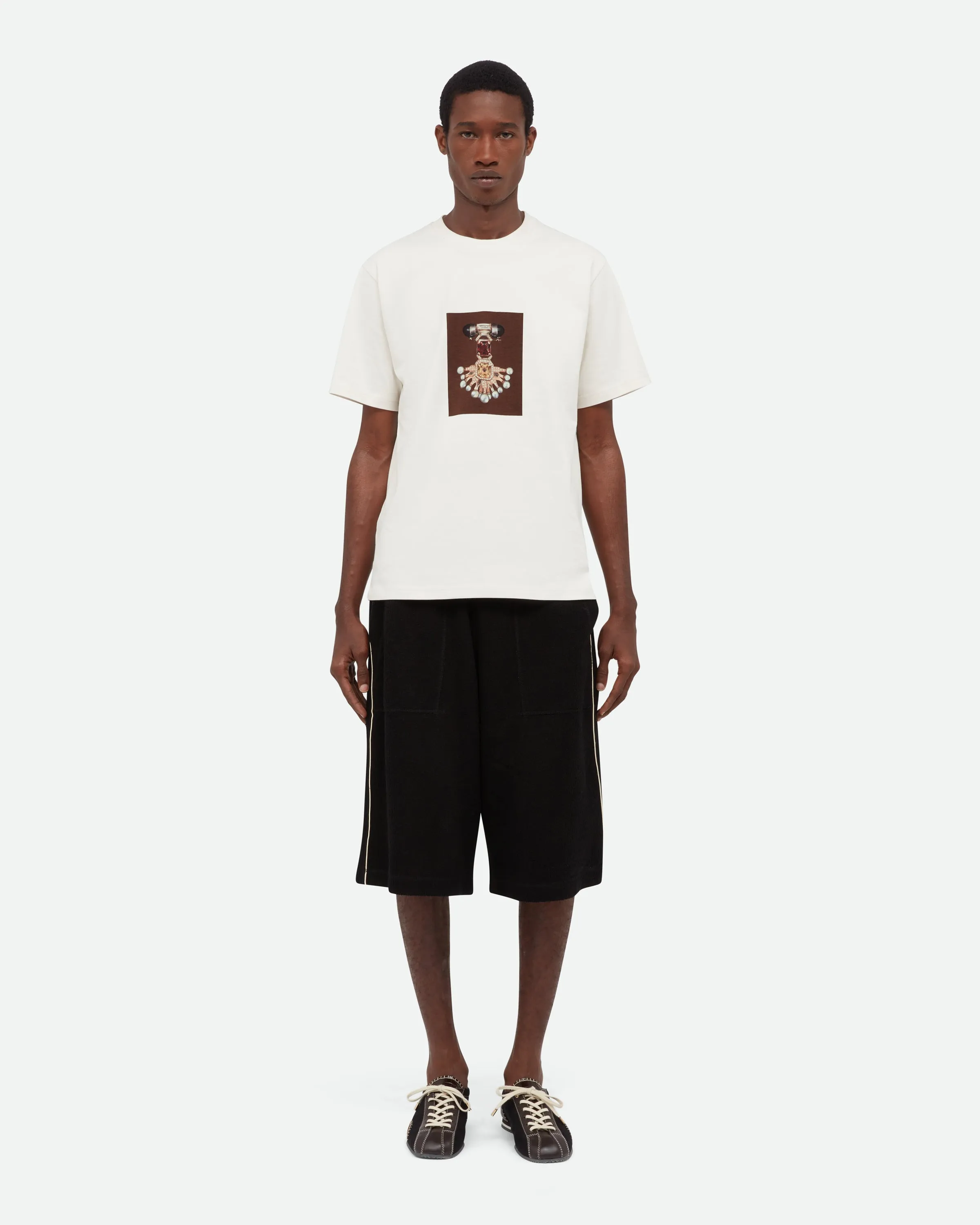 Compass Tee sold by Wales Bonner