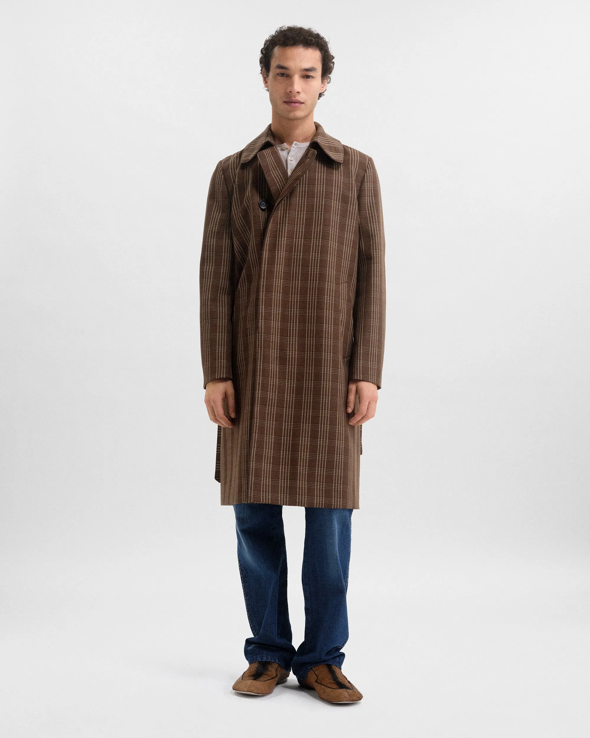 Linear Coat sold by Wales Bonner
