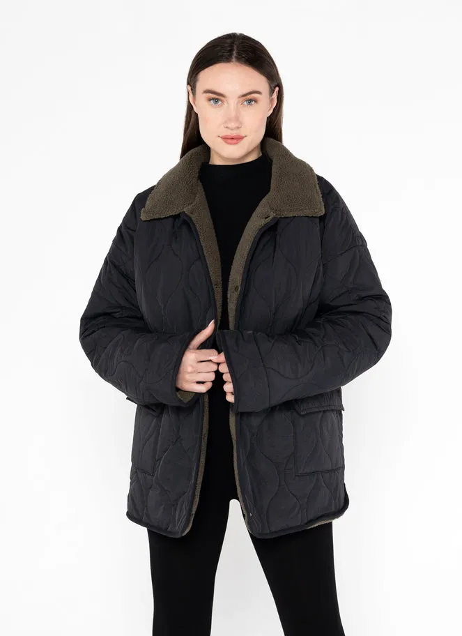 Nylon Reversible Quilt Jacket sold by C’est Moi