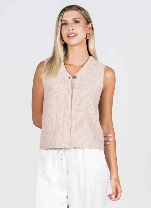 Knit Sweater Hidden Button Vest sold by C’est Moi