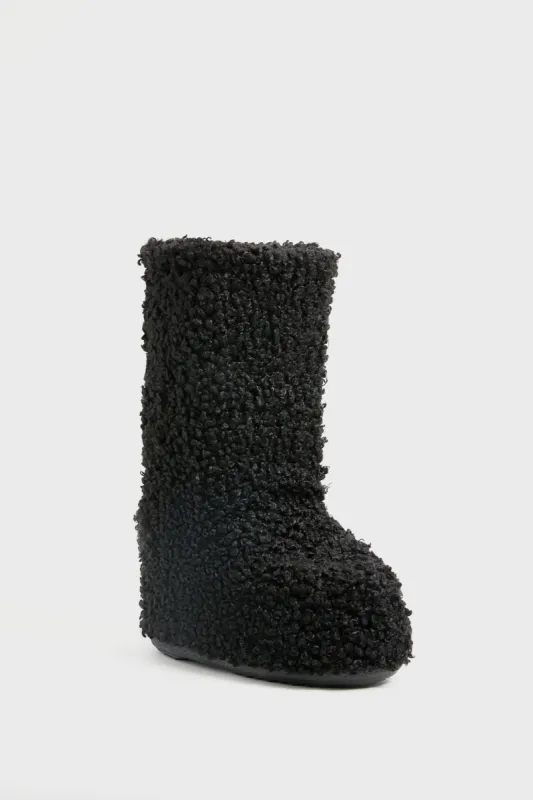 Black Icon Faux Astrakan Boots sold by Tuckernuck