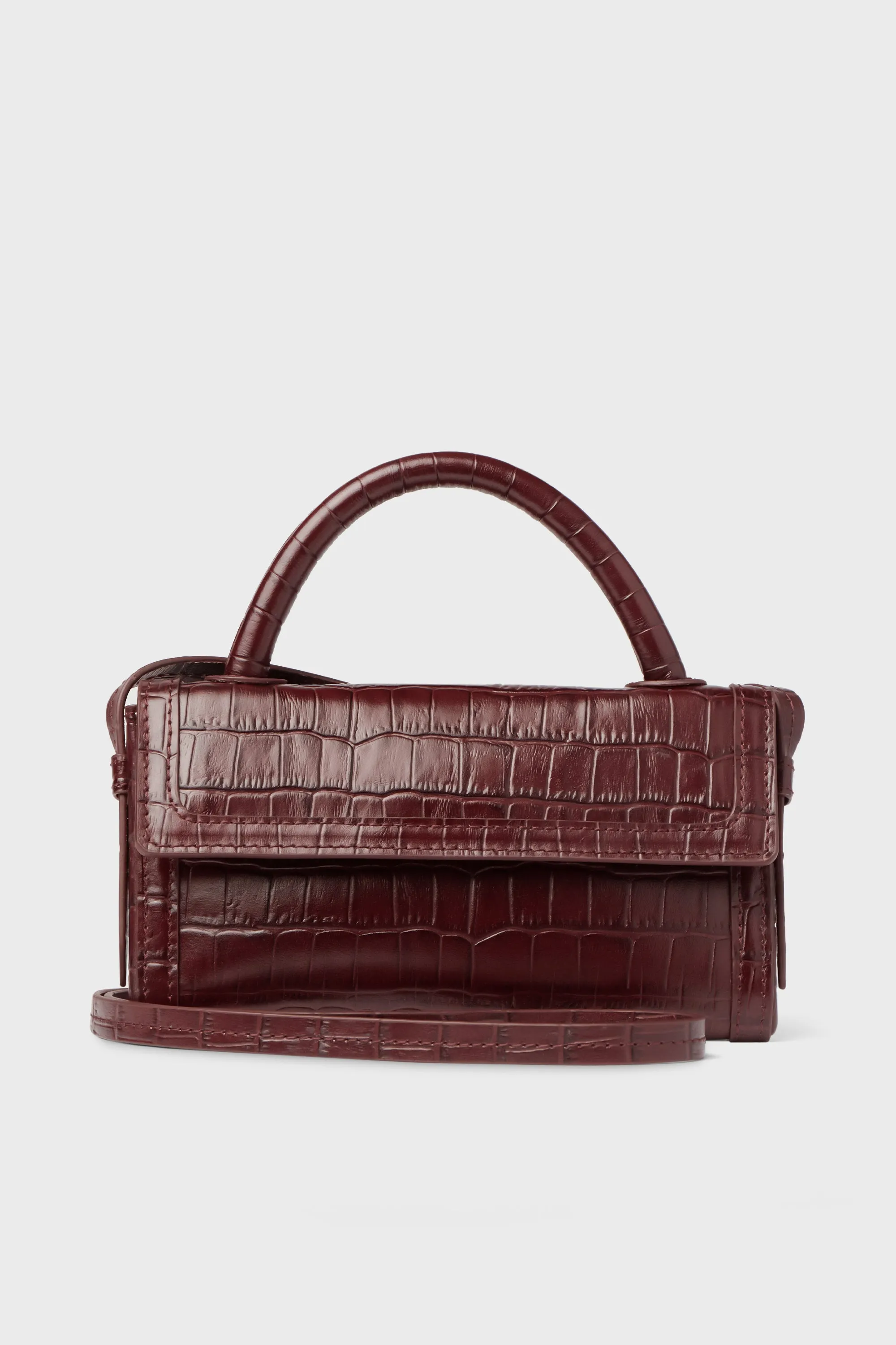 Exclusive Chocolate Croc Phone Crossbody sold by Tuckernuck