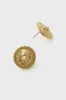 Gold Colette Studs sold by Tuckernuck