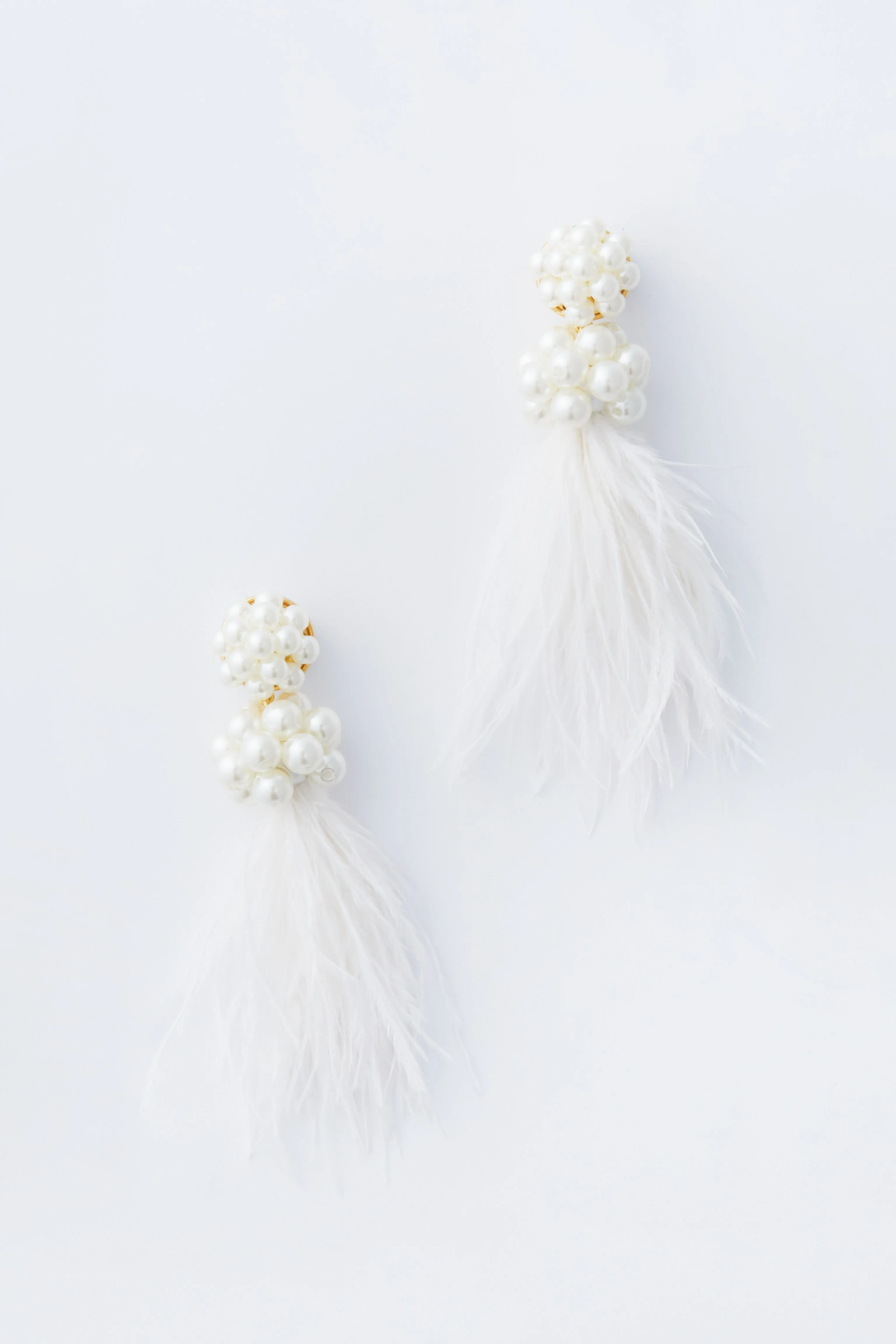 White Feather Nicole Earrings sold by Tuckernuck