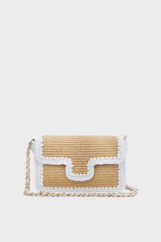 Natural and White Woven Crossbody sold by Tuckernuck