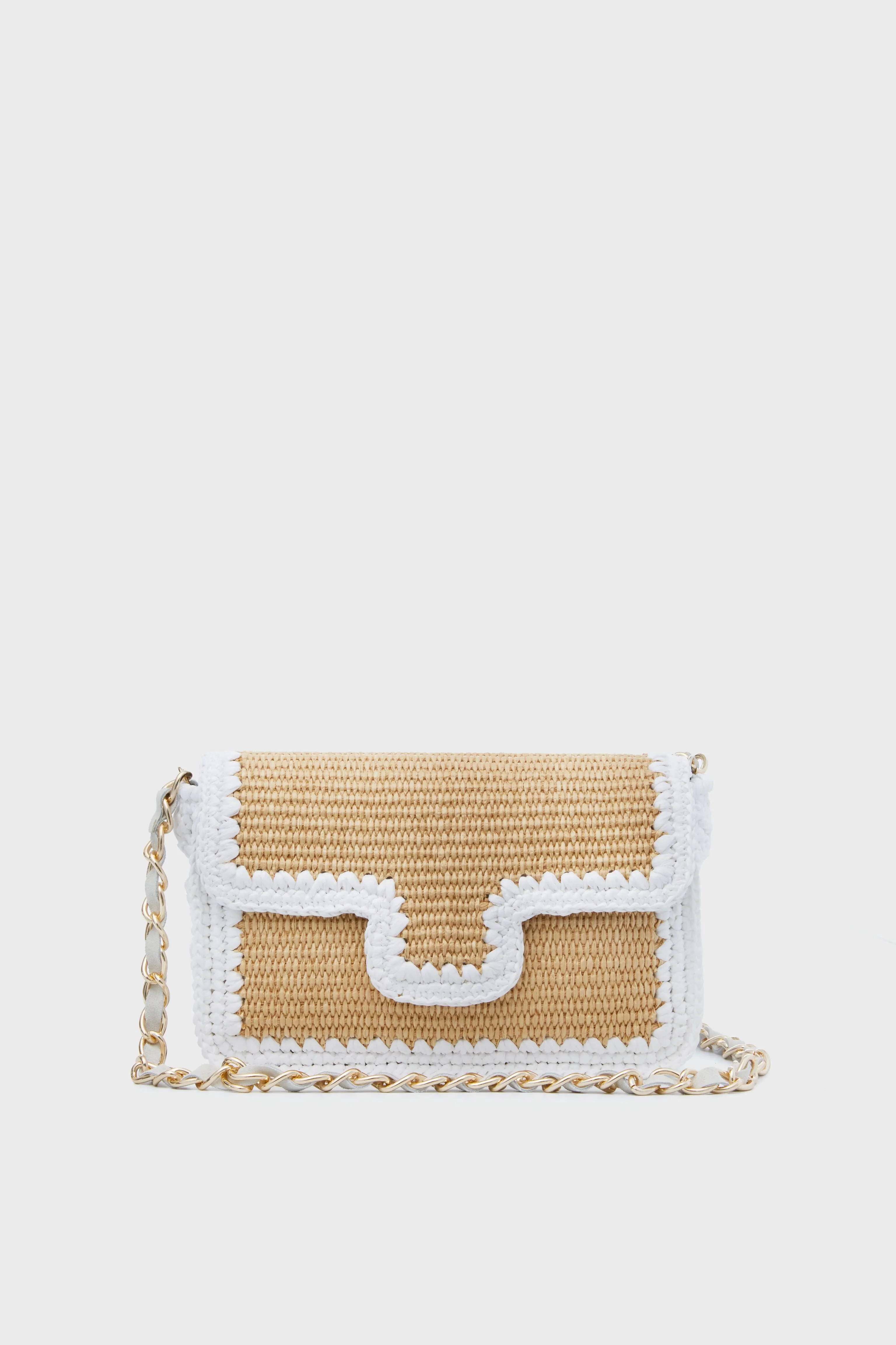 Natural and White Woven Crossbody sold by Tuckernuck
