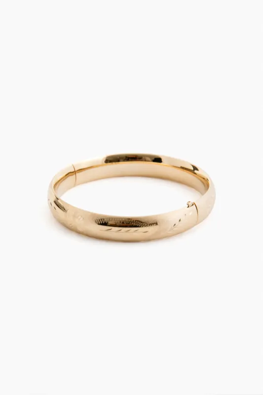 14k Yellow Gold Classic Etched Floral Bangle (.39"w) sold by Tuckernuck