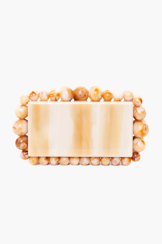 Butterscotch Eos Clutch sold by Tuckernuck