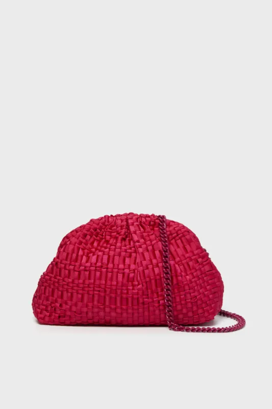 Magenta Game Clutch sold by Tuckernuck