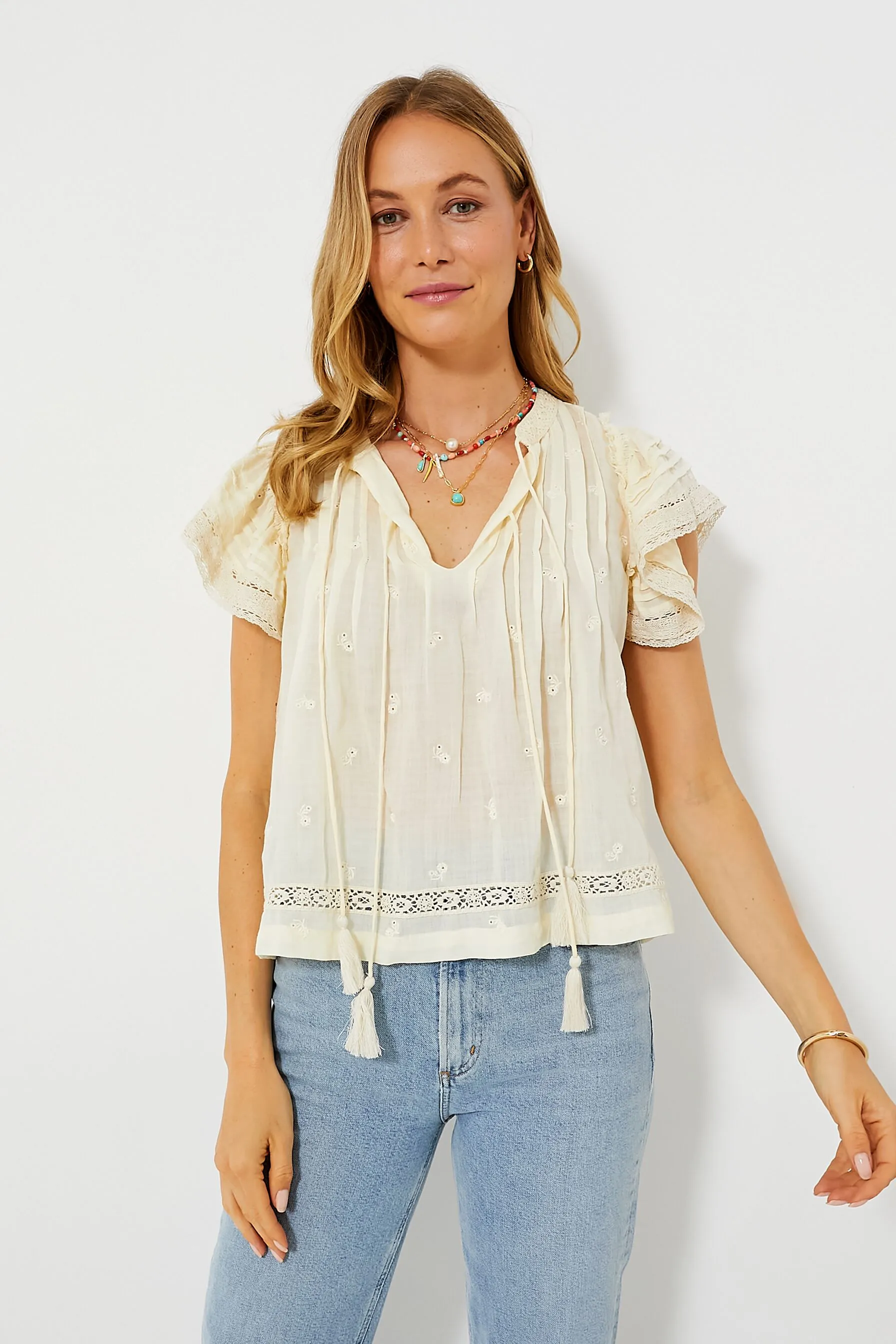 Cream Loren Solid Cambric Flutter Sleeve Top sold by Tuckernuck