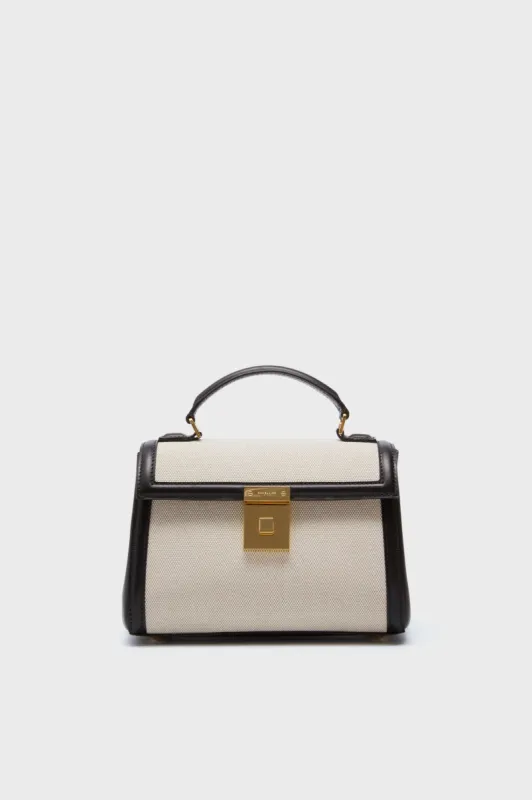 Canvas and Black Paris Bag sold by Tuckernuck