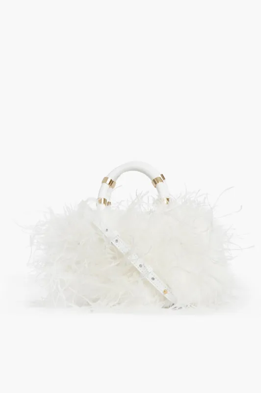 White Emily Feather Bag sold by Tuckernuck