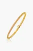14k Gold Fancy Weave Bangle sold by Tuckernuck