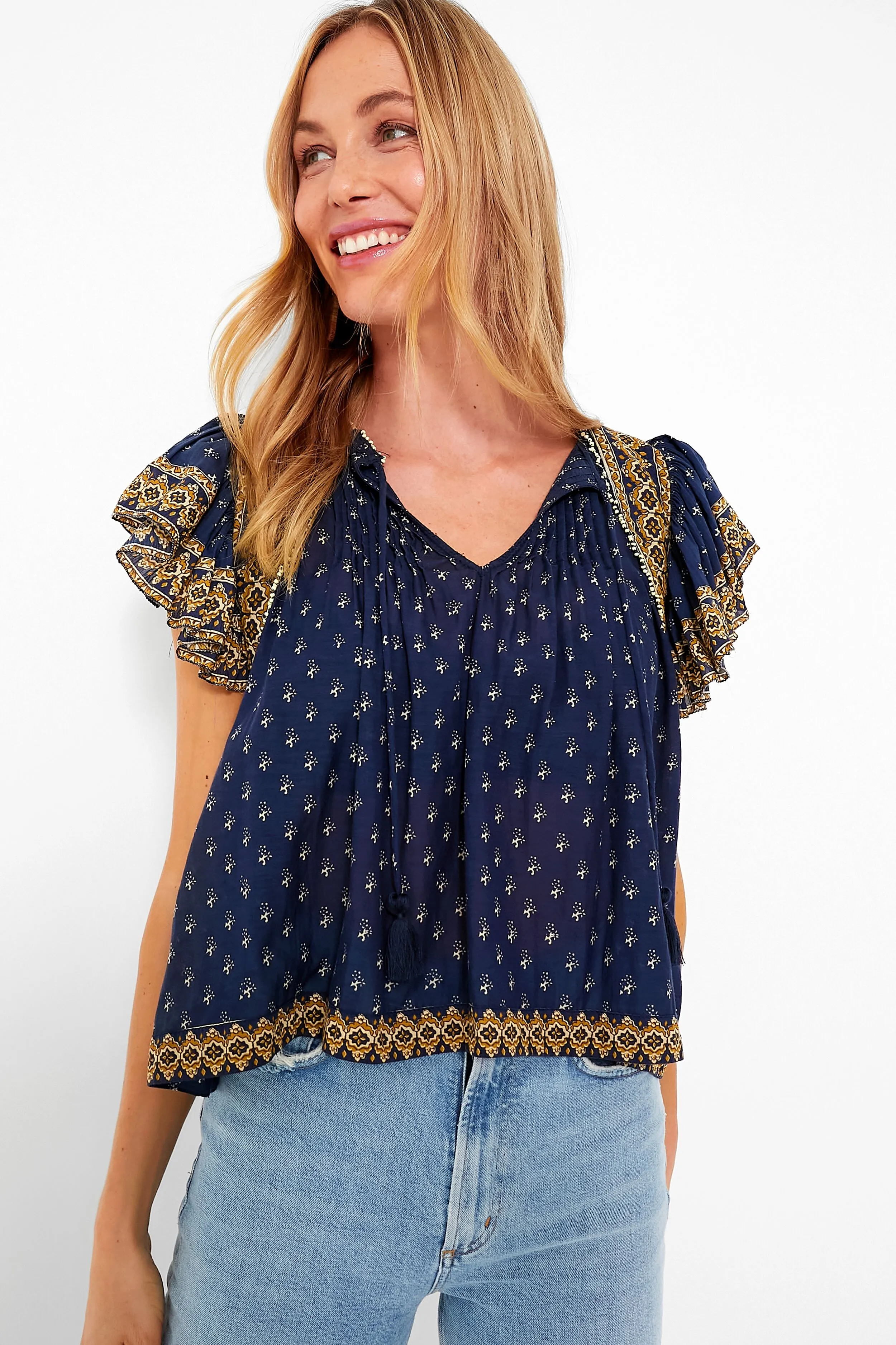 Navy Arlita Print Flutter Sleeve Top sold by Tuckernuck