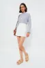 White Denim Agne Mini Skirt sold by Tuckernuck