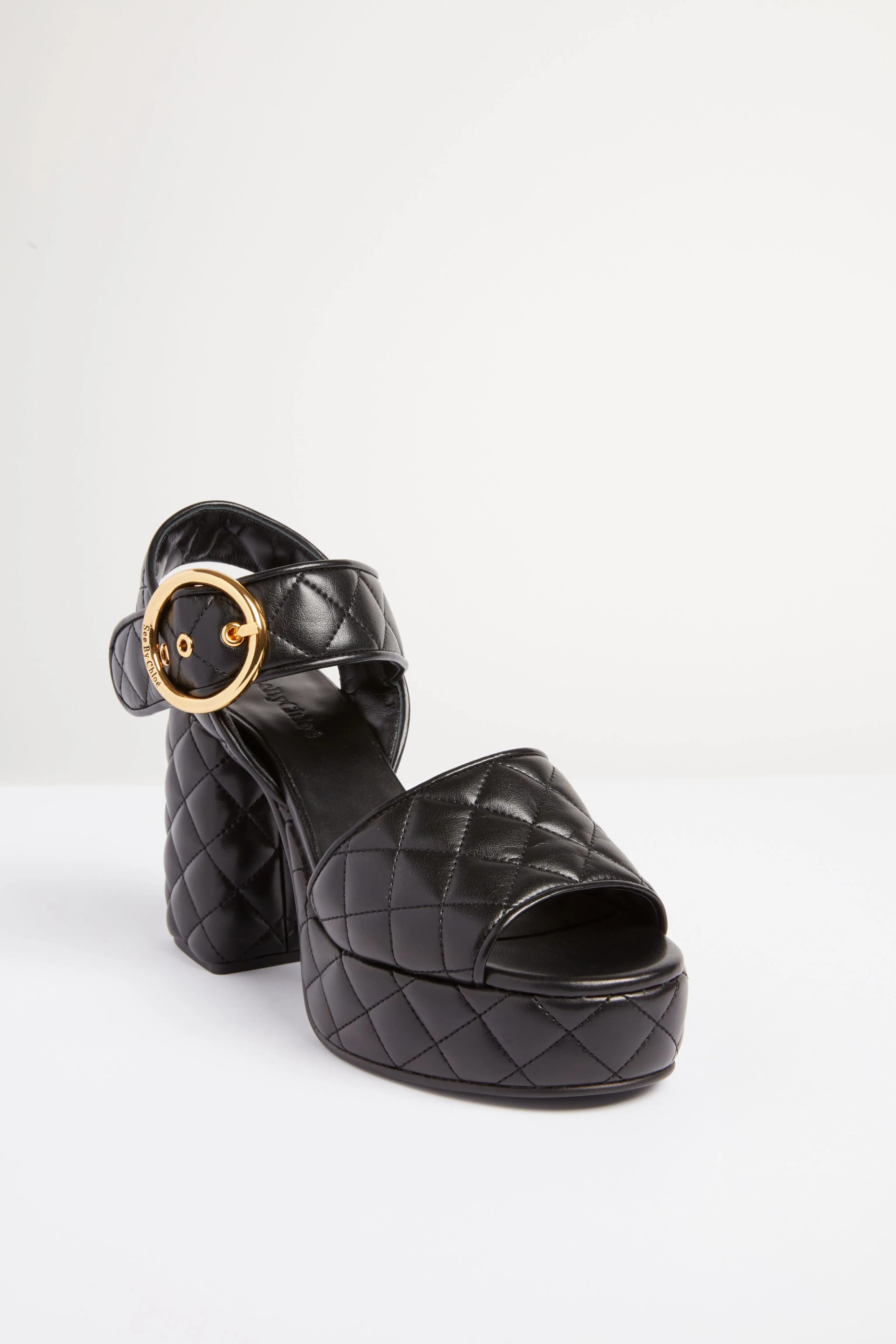 Black Jodie Quilted Heels sold by Tuckernuck