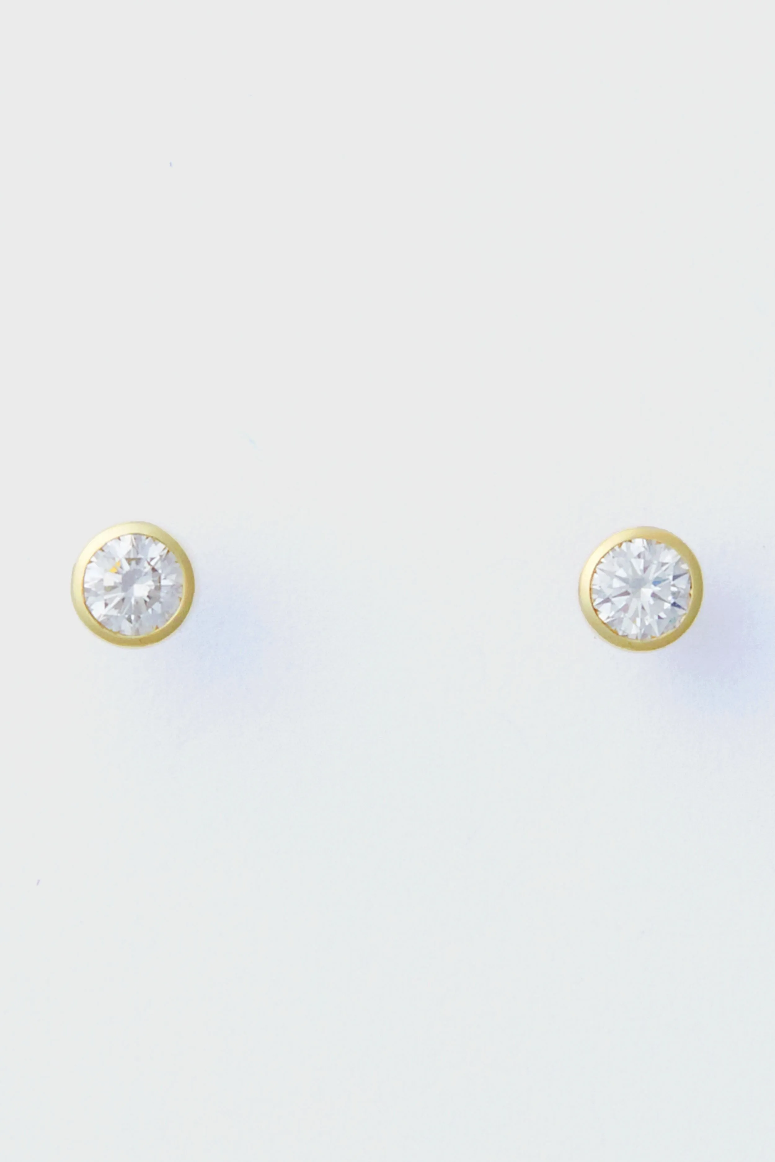 14k Gold Diamond Bezel Stud Earrings sold by Tuckernuck