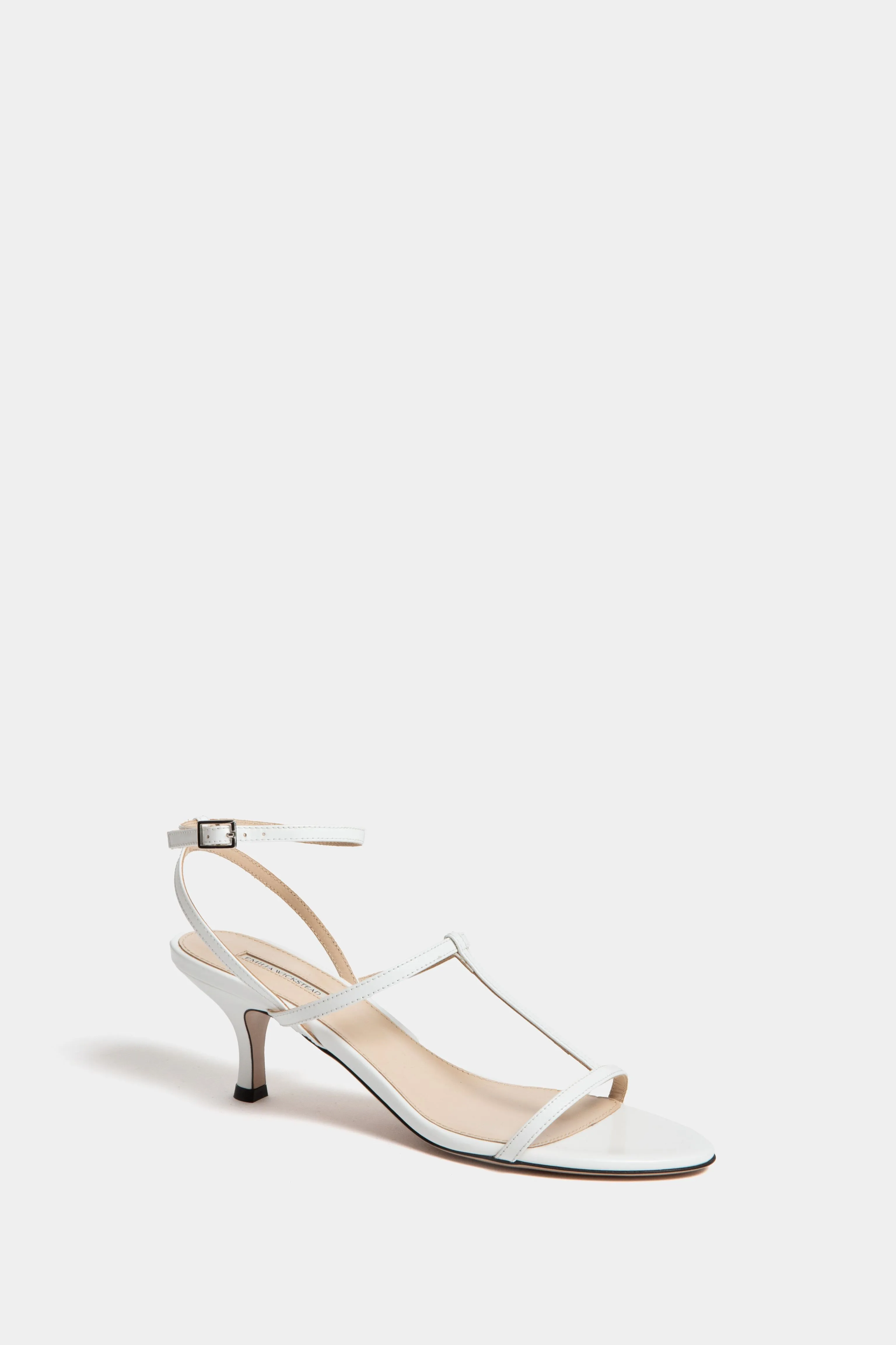 White Novie Leather Kitten Heels sold by Tuckernuck