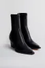 Black Rutger Booties sold by Tuckernuck