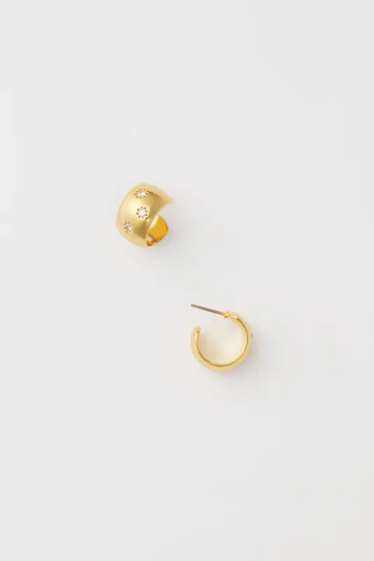 Starry Night Gold Huggie Earrings sold by Tuckernuck