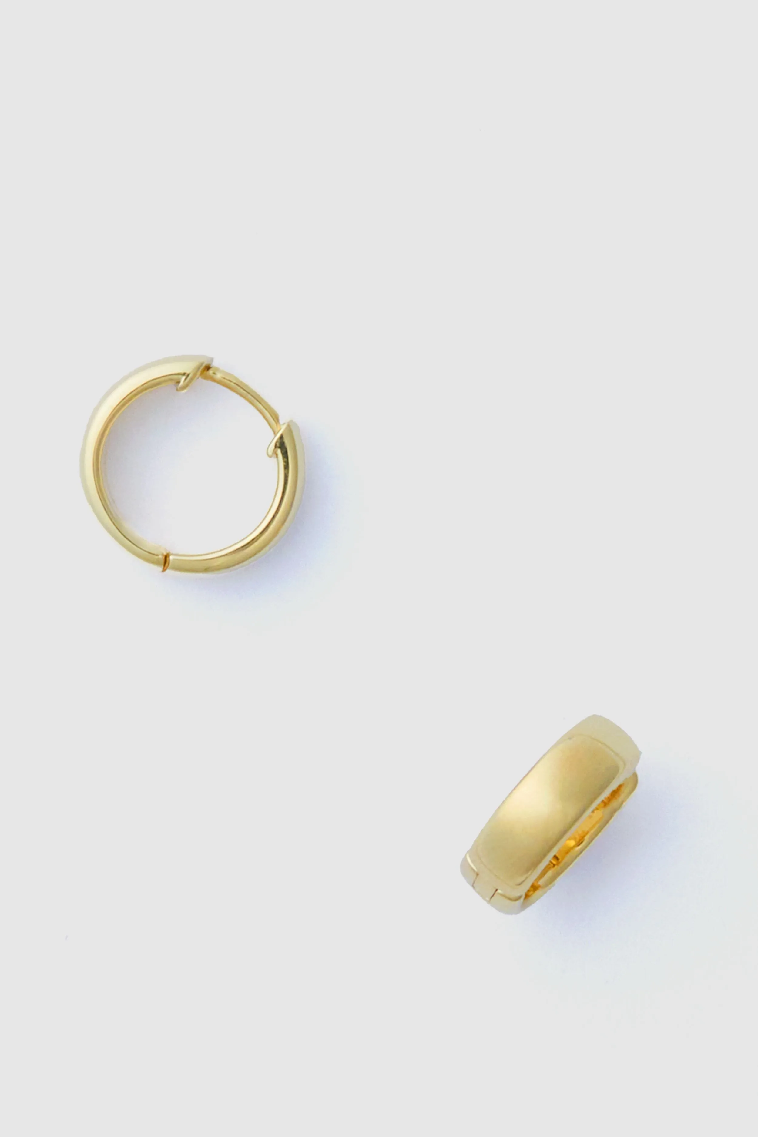 14k Gold Huggie Hoop Earrings sold by Tuckernuck