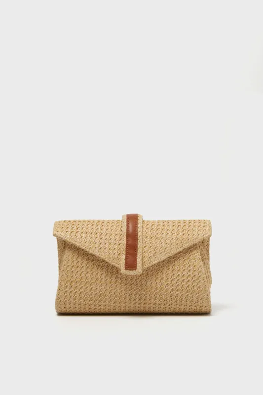 Rowen Raffia Envelope Clutch sold by Tuckernuck