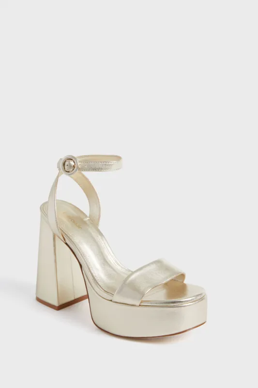 Gold Dolly Heels sold by Tuckernuck