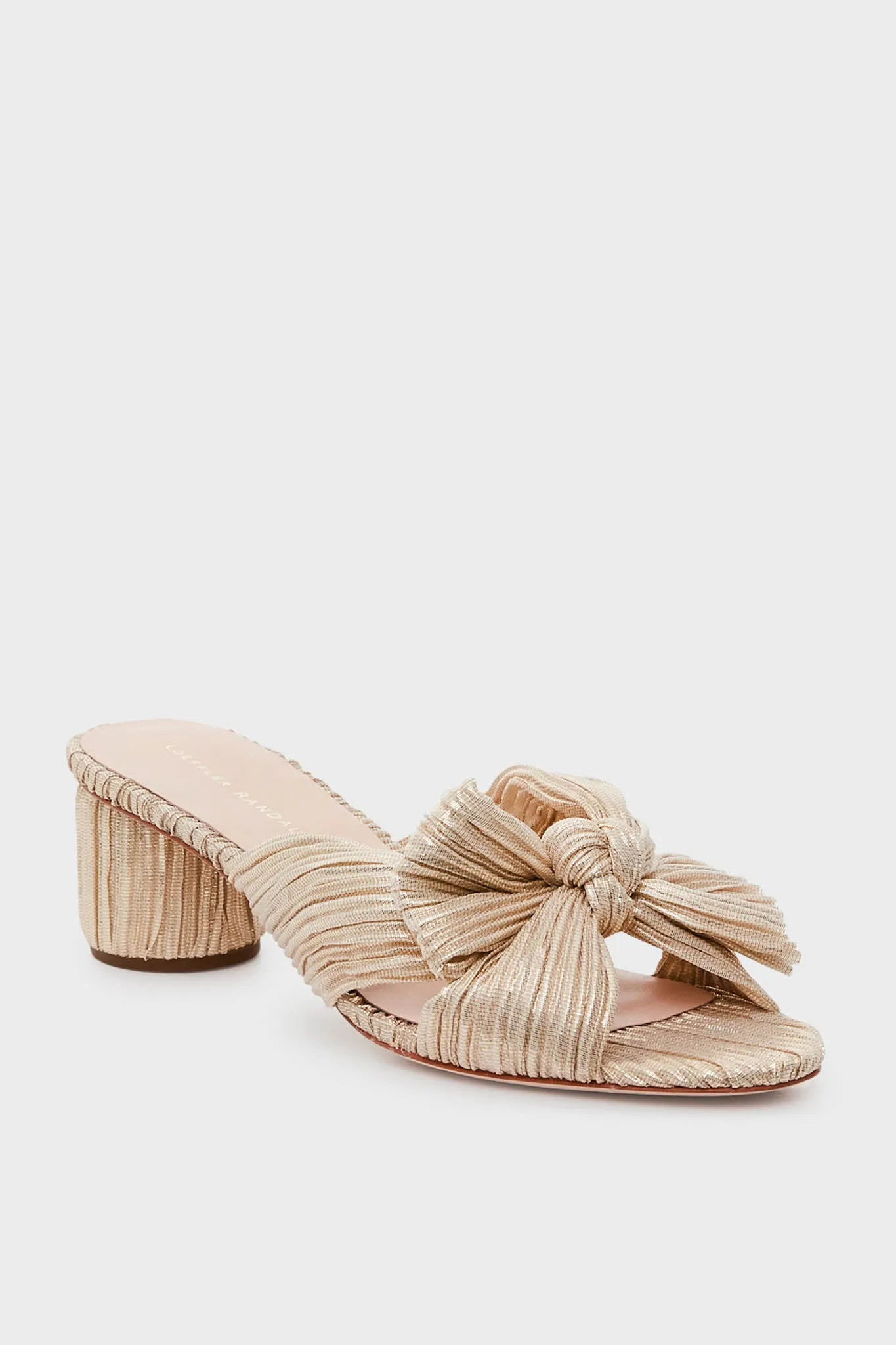 Exclusive Platinum Emilia Pleated Knot Mules sold by Tuckernuck
