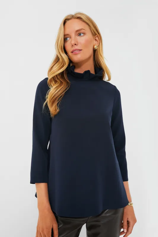 Navy Faye Blouse sold by Tuckernuck