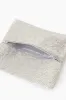 Silver Beaded Clutch sold by Tuckernuck
