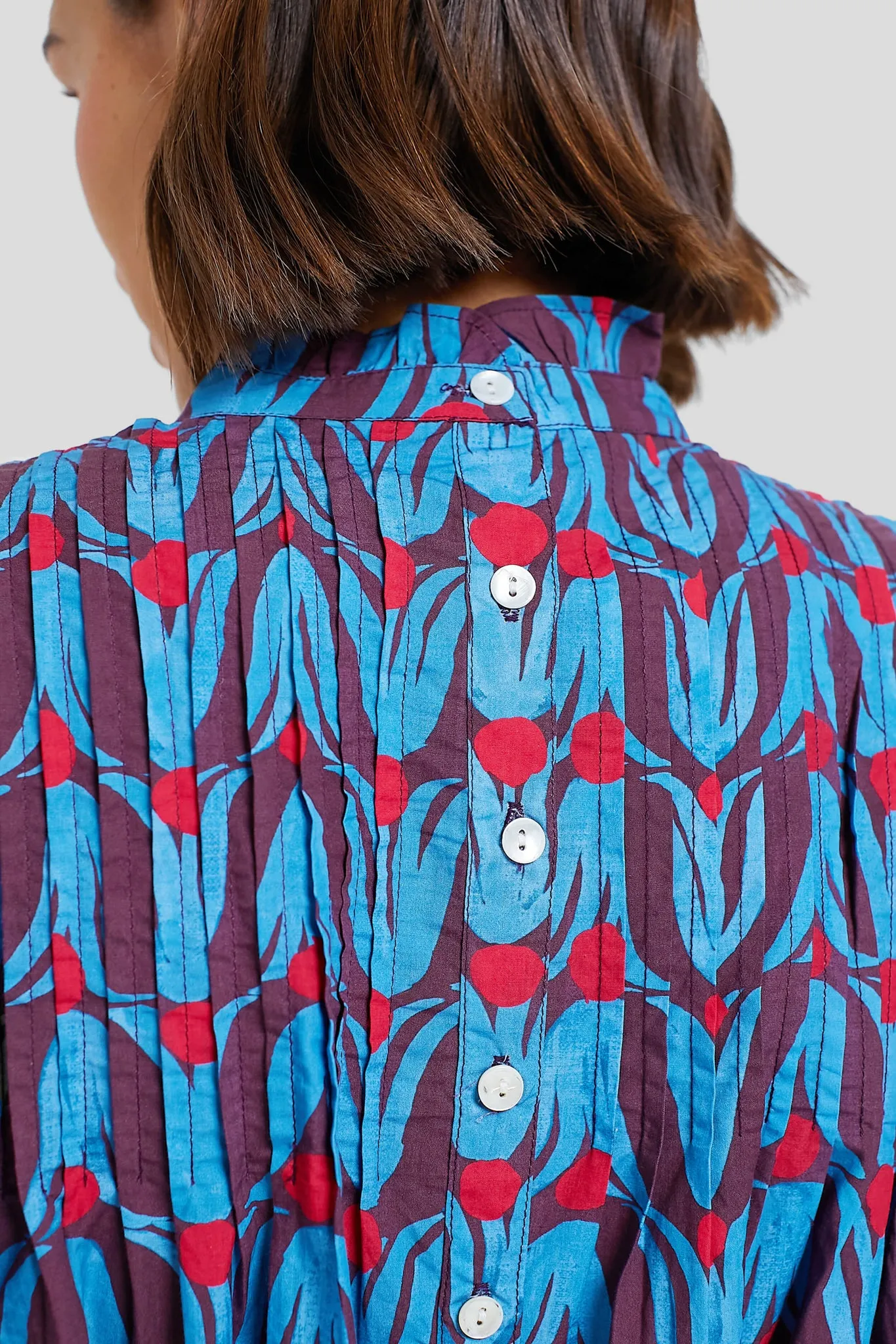 Tulip Red Pintuck Ruffle Top sold by Tuckernuck product image thumbnail 5