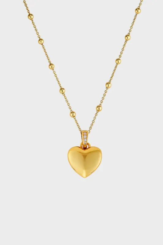 Gold Puffy Heart Mini Locket sold by Tuckernuck