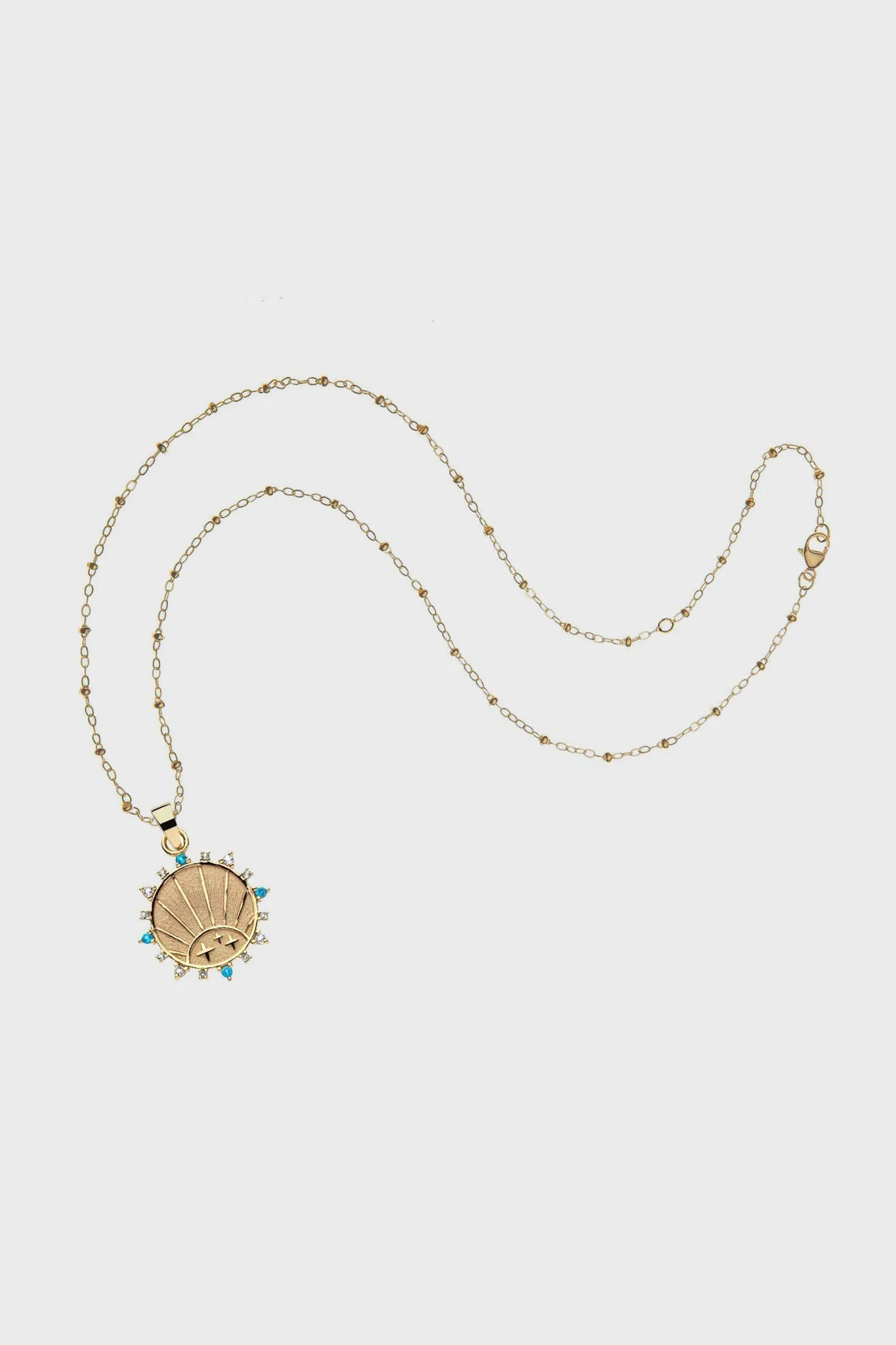 Gold Strong Rising Sun Petite Embellished Pendant Coin sold by Tuckernuck product image thumbnail 3