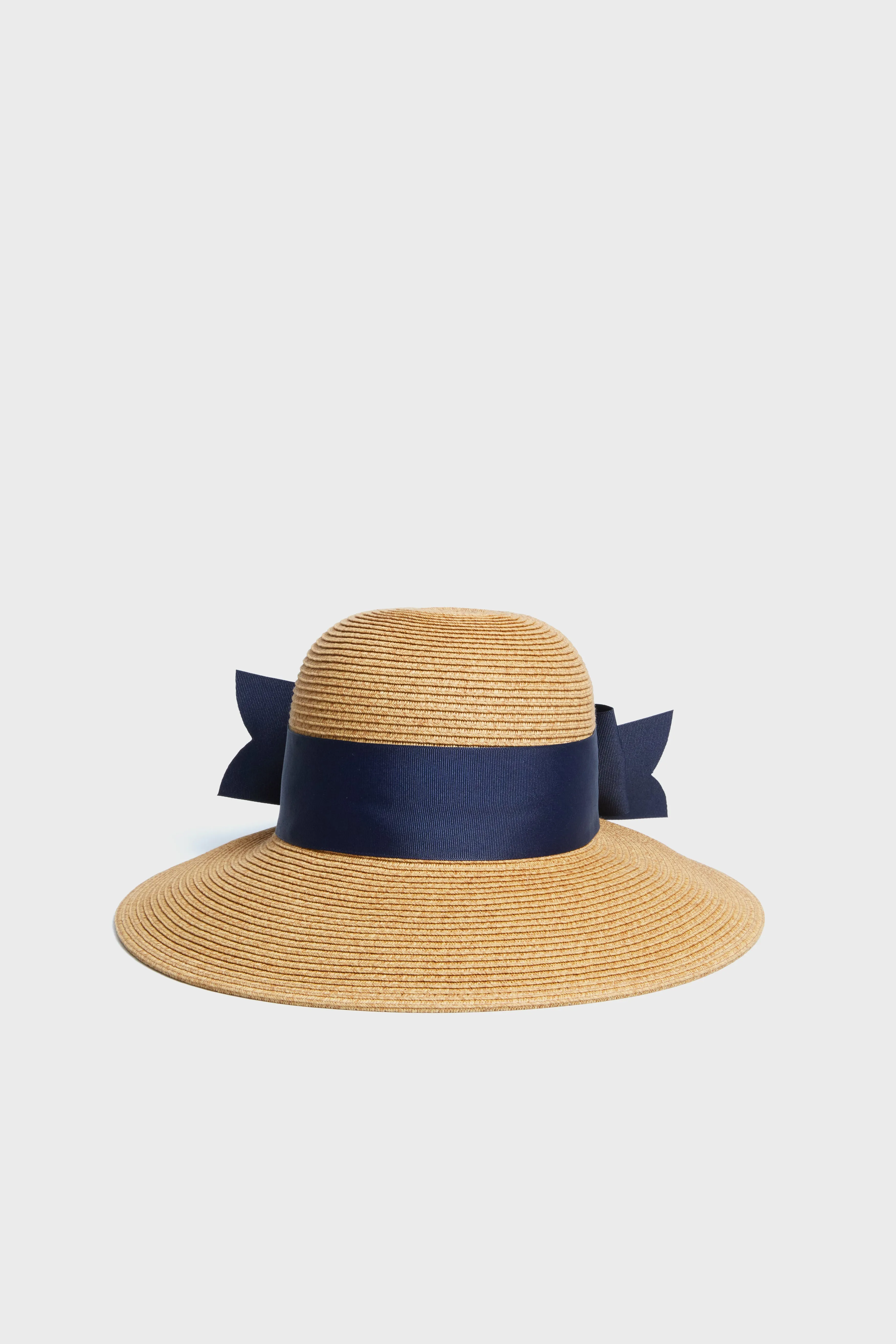 Exclusive Navy Packable Wide Bow Sunhat sold by Tuckernuck
