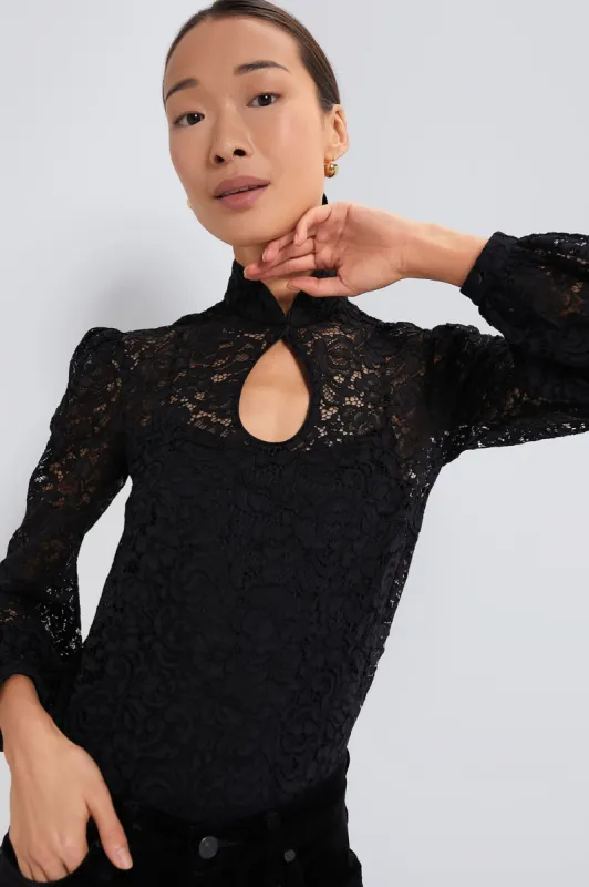 Black Domino Top sold by Tuckernuck