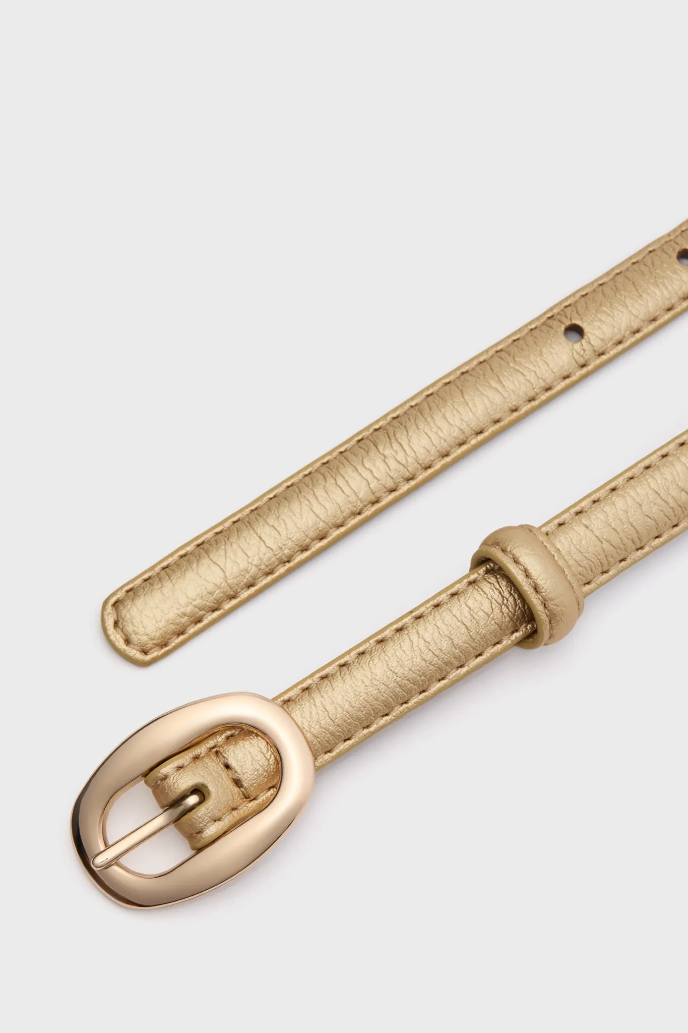 Pebbled Gold Oval Buckle Skinny Belt sold by Tuckernuck product image thumbnail 4