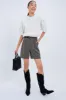 Black Oval Buckle Skinny Belt sold by Tuckernuck